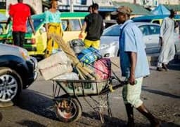 Wheelbarrow pusher stabs customer to death, steals belongings