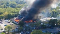 Gunman opens fire, sets church ablaze in US