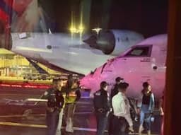 2 passenger jets collide at US airport with a wing slamming into a cockpit window