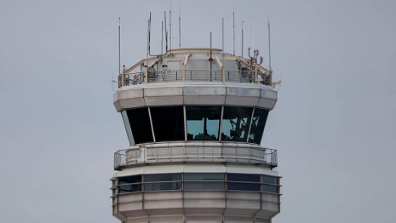 Government shutdown hits air travel in US, closing a control tower and causing delays across the country