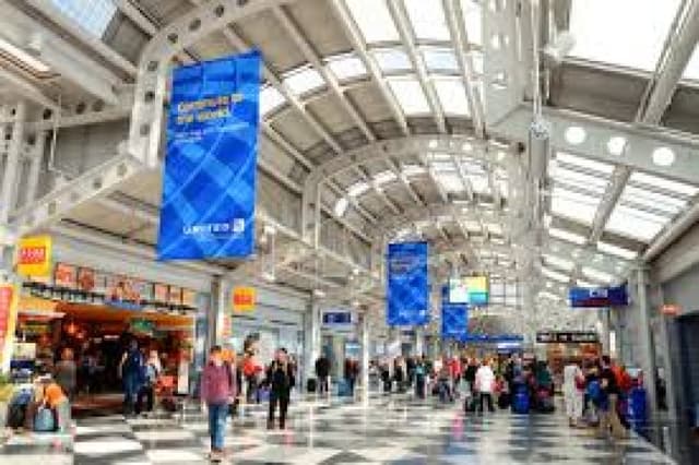 Delays spread to major airports across US, as the seventh day of government shutdown impacts travelers