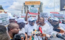 Gridlock on Asaba-Onitsha Niger Bridge as thousands of protesters rally support for Dangote Refinery