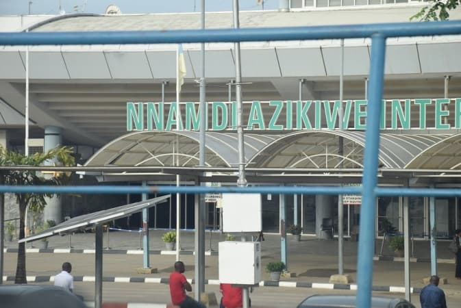 Lady faints during fight with sister at Abuja Airport