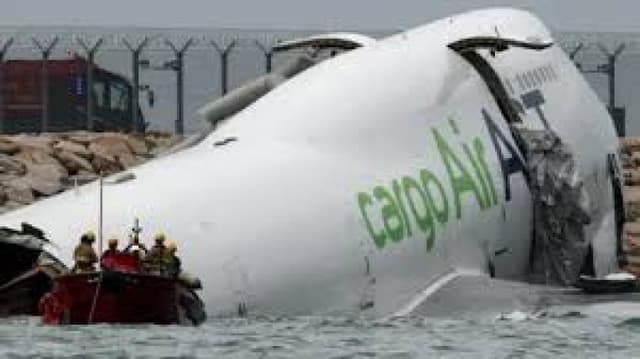 Two dead after cargo plane skids off Hong Kong runway into sea