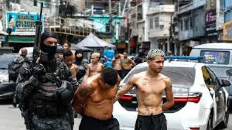 At least 132 killed in Rio police raid, officials say