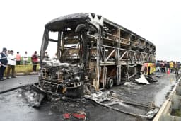 At least 25 killed in India after bus catches fire in crash with motorcycle