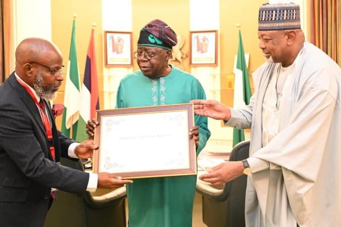 Tinubu receives Nigerian scholar, Prof. Ademola Adenle, winner, inaugural world academy of aciences?M.S. Swaminathan award for food and peace