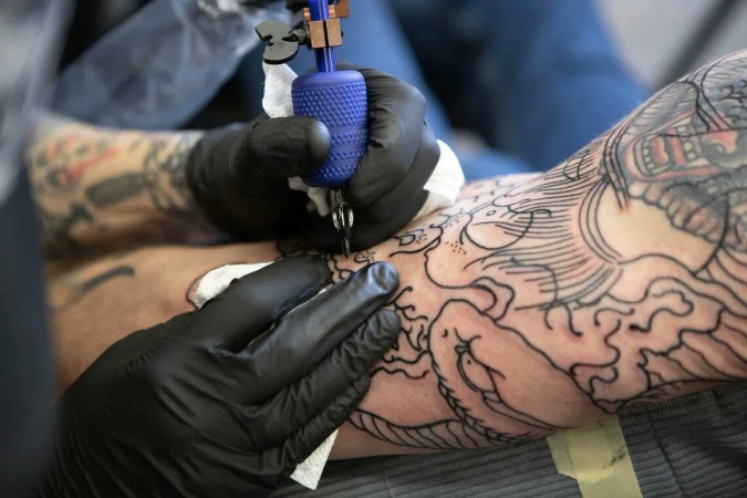 Tattoo ink weakens vaccine effectiveness — Study