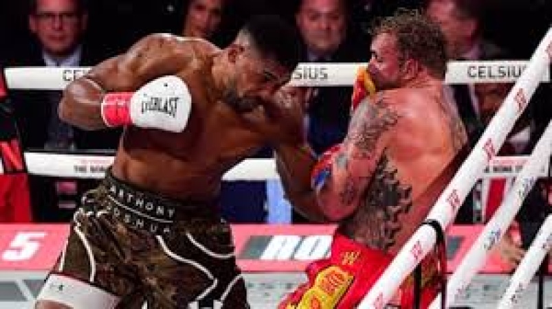 Anthony Joshua calls out Tyson Fury after sending Jake Paul to hospital with broken jaw