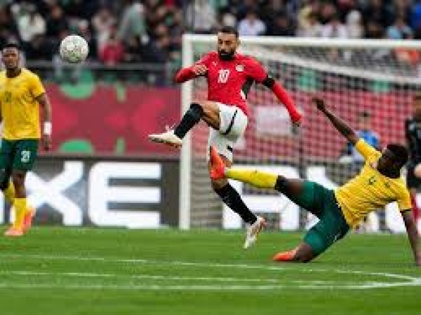 Salah penalty sends Egypt through as ten-man Pharaohs subdue South Africa, Zimbabwe hold Angola