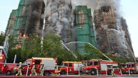 Final death toll from Hong Kong fire placed at 168