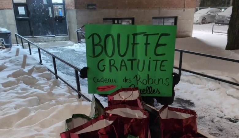 Thieves dressed as Robin Hood give away stolen food to protest Canada’s rising prices