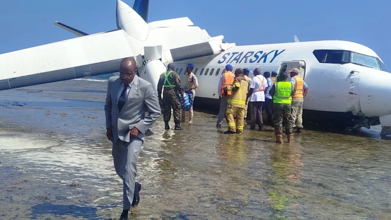 Passenger plane with 55 on board crash-lands on water 