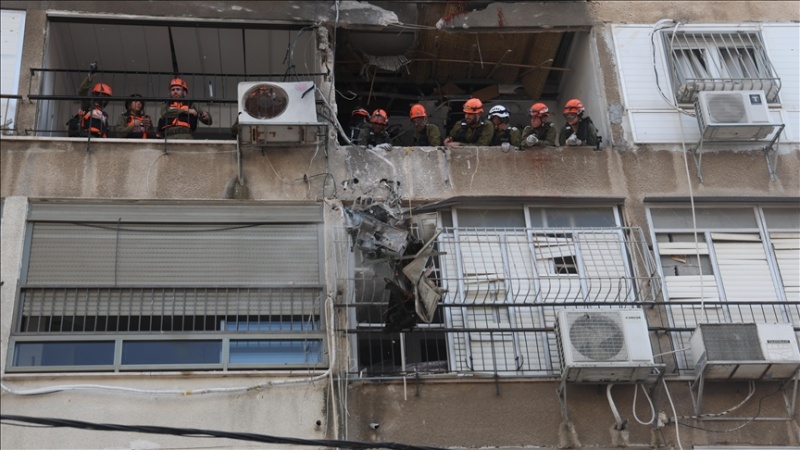 Iranian missile fragments hit multiple sites in central Israel