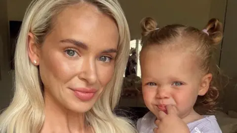 Stranded mother reunited with baby in Dubai