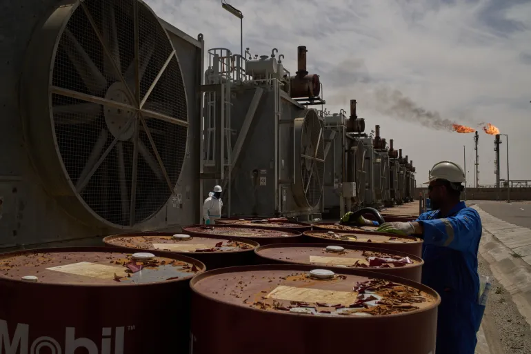 Oil tops $116 a barrel as Iran accuses US of preparing invasion