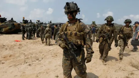 More US Marines and warships to be moved to Middle East, reports say