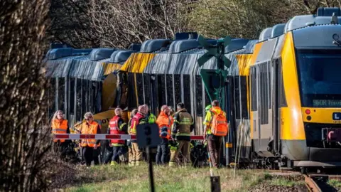 Two trains collide head-on in Denmark, leaving five critically hurt