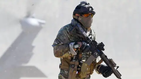 Rescue team in Iran face 'harrowing and dangerous' search for US crew member