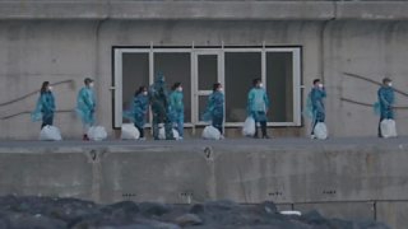 Last passengers leave virus-hit cruise ship as three more test positive
