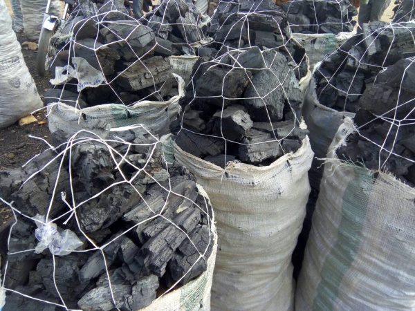 FCT residents resort to charcoal, firewood amid rising energy costs