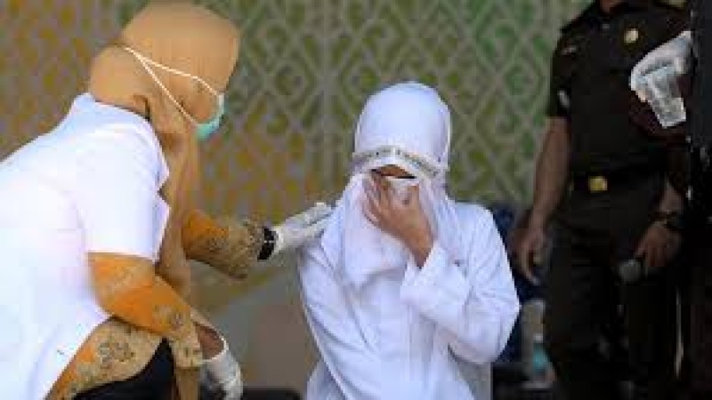 Woman passes out after receiving 100 strokes of cane for having sex outside marriage