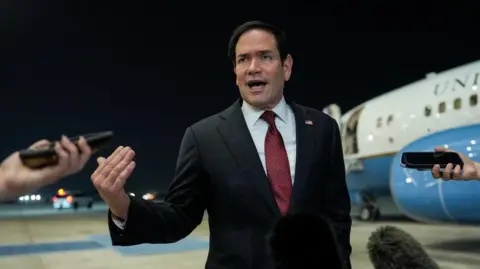 UN says it will evacuate sailors stranded in Strait of Hormuz, as Rubio warns against tolls