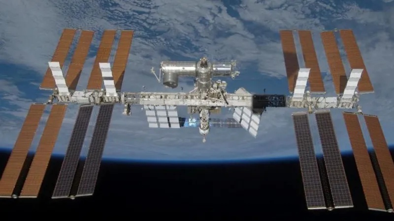 Astronauts return to ISS after sheltering during air leak repair attempt 