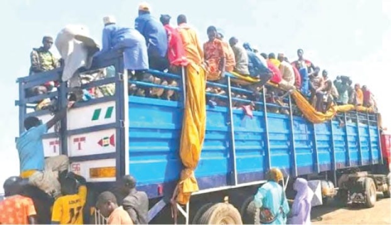 ‘Why we ride atop trailers from Port Harcourt to Sokoto’