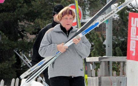 German Chancellor Angela Merkel injured in skiing accident . . .  as Schumacher remains in critical condition