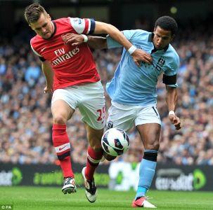 English Premiership: Arsenal fight back to maintain unbeaten run, hold City 1-1