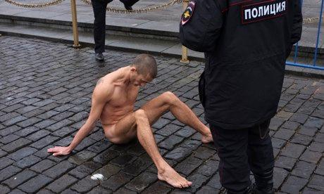 Man strips self naked, nails testicles in public square to protest police brutality