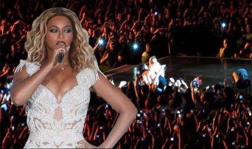 Crazed fan pulls BeyoncÃ© off stage during performance