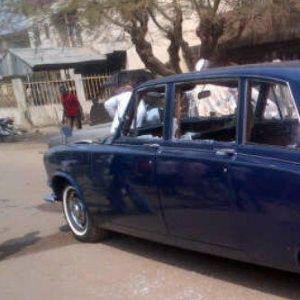 Pictured: The bullet-riddled car in which Emir of Kano nearly lost his life