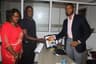HERE ARE THE KEYS: Founder/Vice President, Yudala, Prince Nnamdi Ekeh (R) presents the key of a brand new Kia Rio to Mr. Samuel Uadiala who was accompanied by his wife, Jummai (L). Mr. Uadiala emerged the lucky winner of the grand prize in a raffle draw conducted at the end of the Yudala Zero Gravity Concert and Black Friday Sales on November 29th 2016.