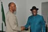 R-L: Governor David Umahi being congratulated on his electoral victory at the Supreme Court by his Ondo State counterpart and Chairman of the Peoples Democratic Party Governors Forum, Dr. Olusegun Mimiko, shortly before the PDP Governors Forum meeting in Abuja . . . on Wednesday night, January 27, 2016. Photo: Ebonyi State Government.