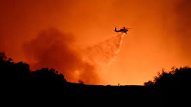 Los Angeles fires expand as winds forecast to pick up