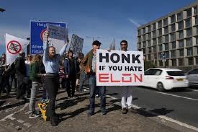 Elon Musk protesters gather at Tesla showrooms