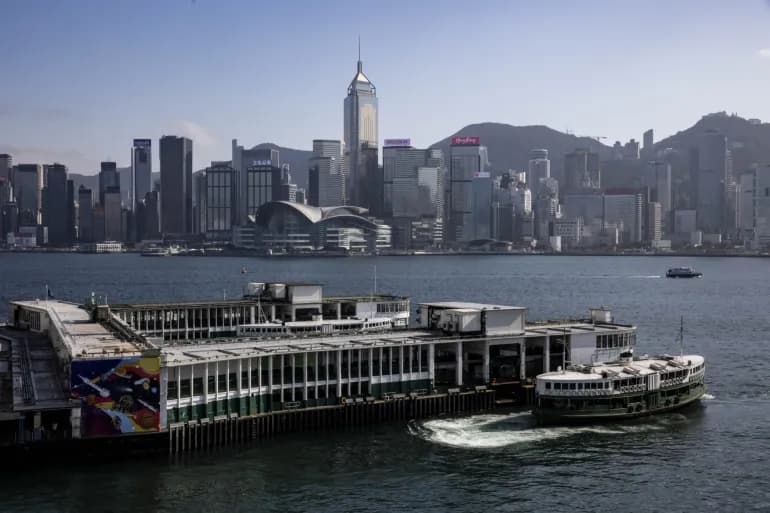 Hong Kong cancels passports, bans financial support for wanted activists