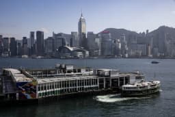 Hong Kong cancels passports, bans financial support for wanted activists