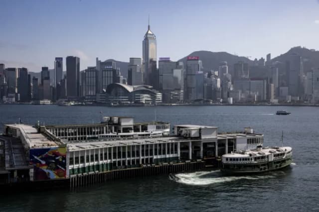 Hong Kong cancels passports, bans financial support for wanted activists