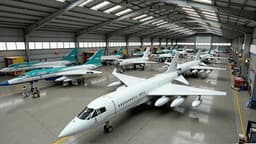 The world’s largest factory employs 30,000 people, could hold 3,753 Olympic pools, and can build eight jets at once