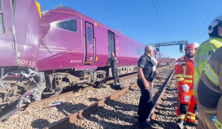 Train driver killed, dozens injured as two passenger trains collide in UK